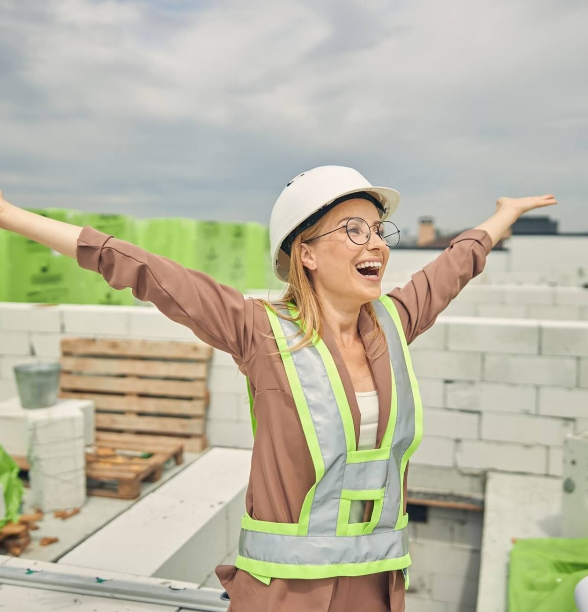 female-contractor-admiring-a-new-construction-object